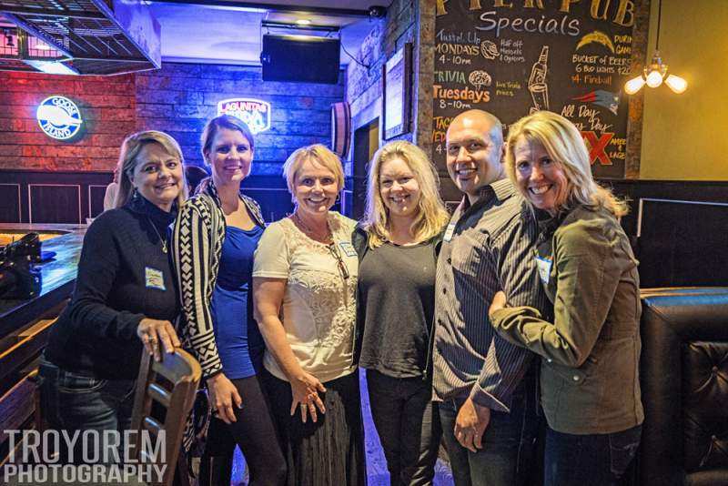 Photo of: Tami Fuller's Real Estate Team and Wonderland Ocean Pub host an OBMA Sundowner, Jan. 2014