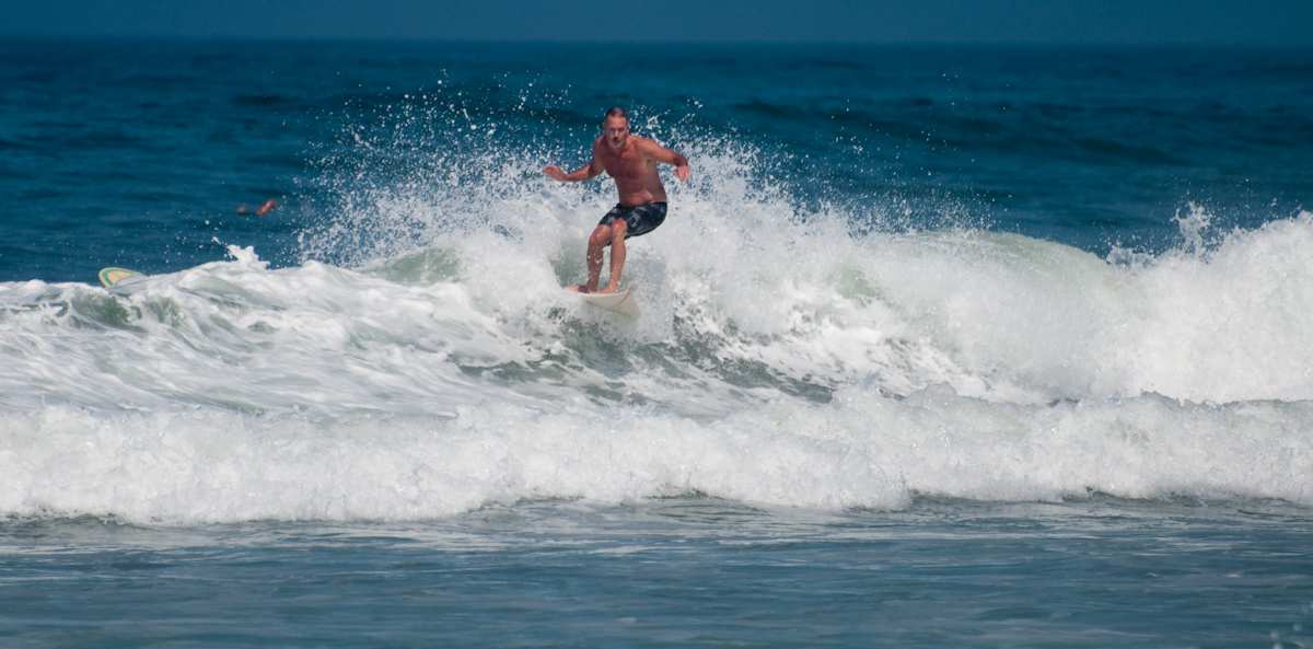 Surfer at Ocean Beach Grom Fest in San Diego California