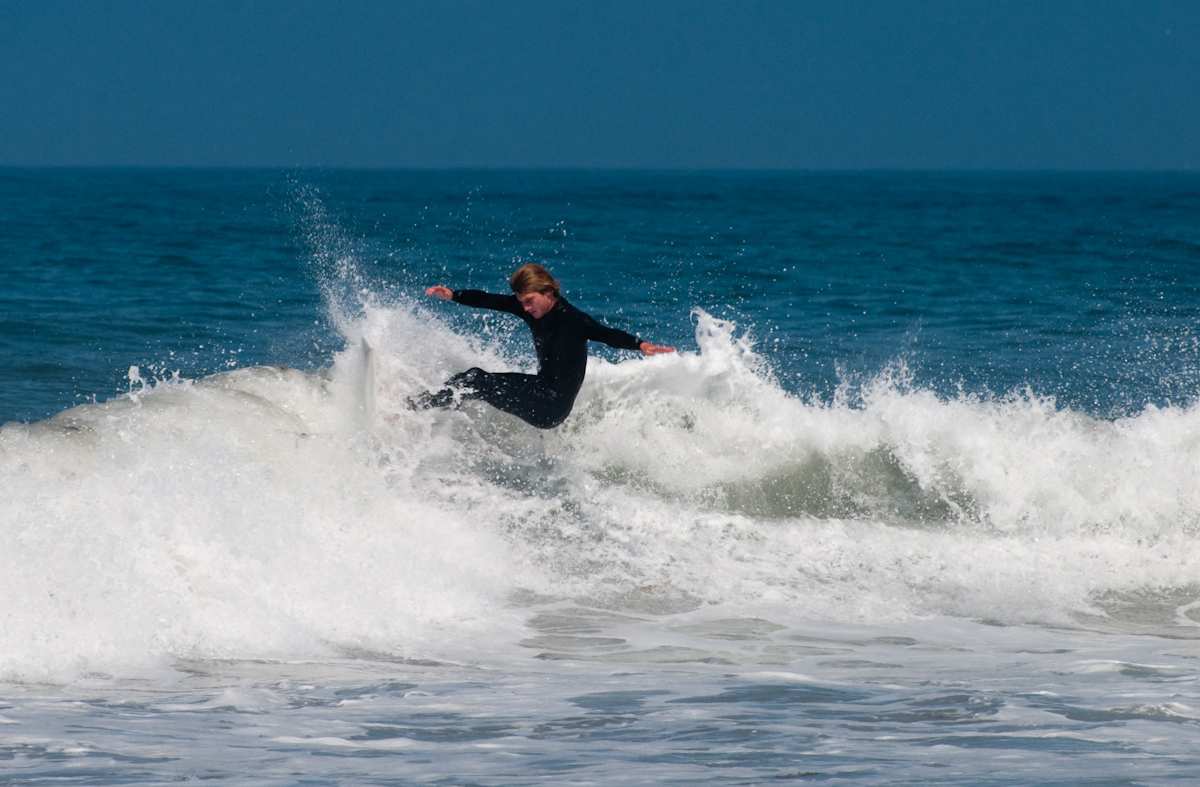 Surfer at Ocean Beach Grom Fest in San Diego California