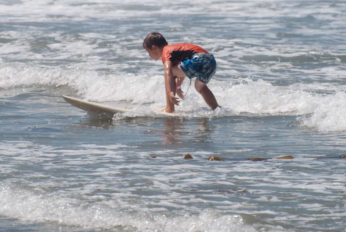 Surfer at Ocean Beach Grom Fest in San Diego California