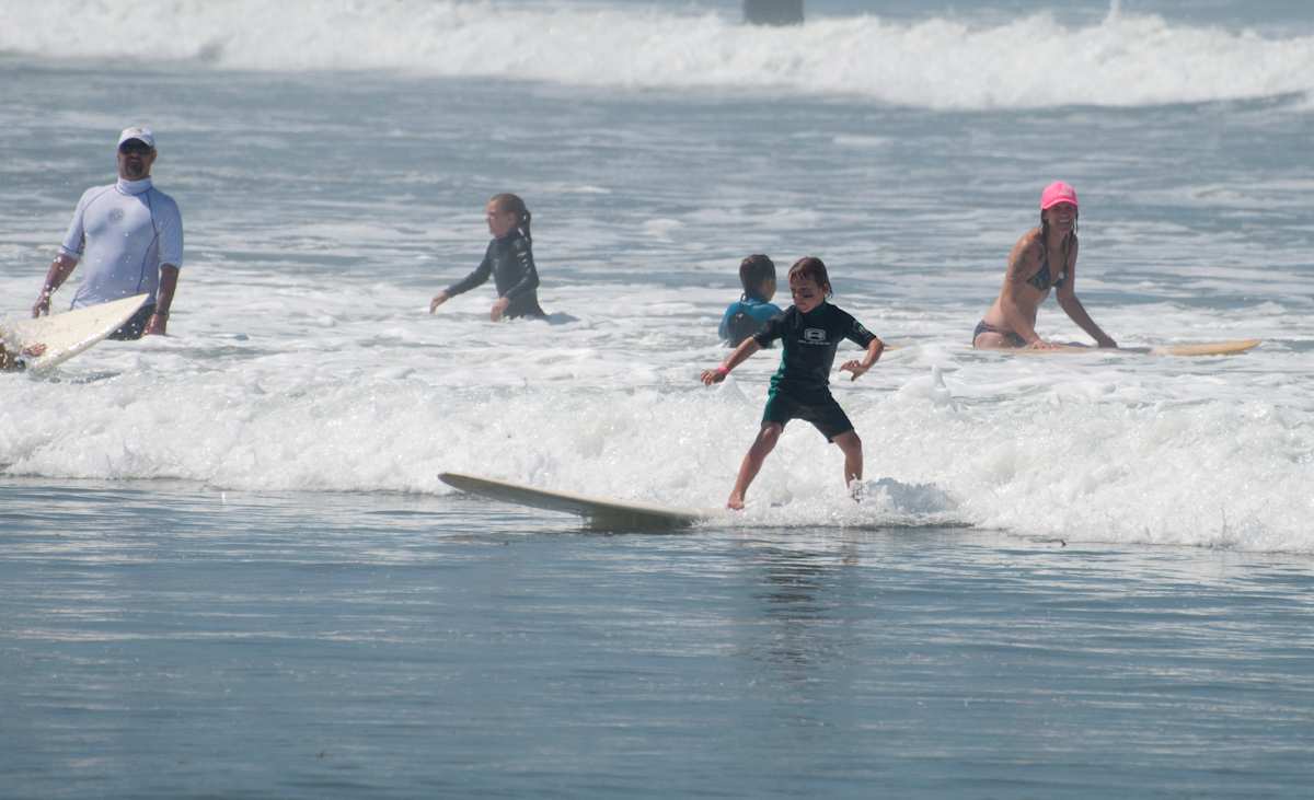 Surfer at Ocean Beach Grom Fest in San Diego California