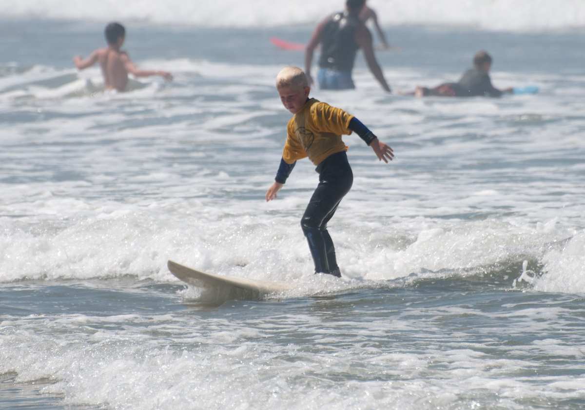 Surfer at Ocean Beach Grom Fest in San Diego California