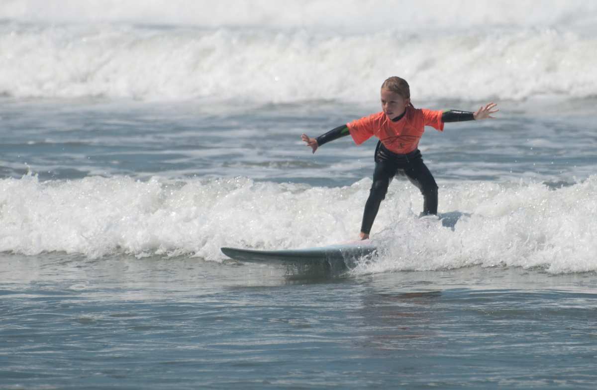 Surfer at Ocean Beach Grom Fest in San Diego California