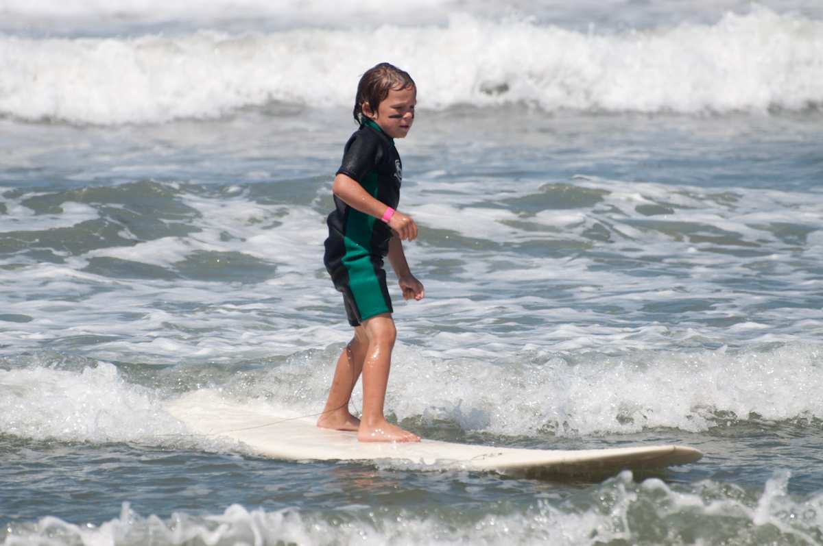 Surfer at Ocean Beach Grom Fest in San Diego California