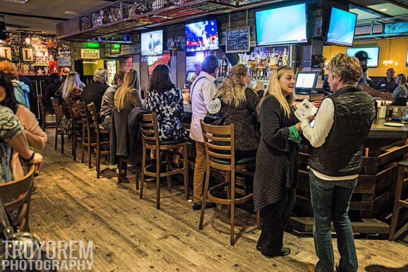 Photo of: Tami Fuller's Real Estate Team and Wonderland Ocean Pub host an OBMA Sundowner, Jan. 2014