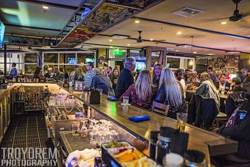 Photo of: Tami Fuller's Real Estate Team and Wonderland Ocean Pub host an OBMA Sundowner, Jan. 2014